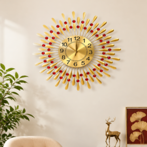 Gold Sunburst Wall Clock with Red Round Crystals